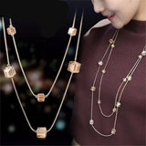Long Collier " Mujer"et Pendentif en perle Or Cristal  très raffiné